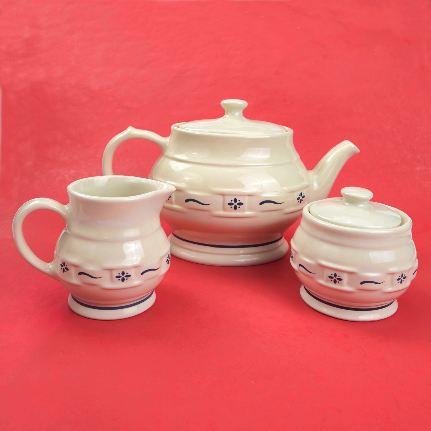 RETIRED LONGABERGER POTTERY LOT:  WOVEN TRADITIONS TEAPOT, CREAMER, SUGAR0