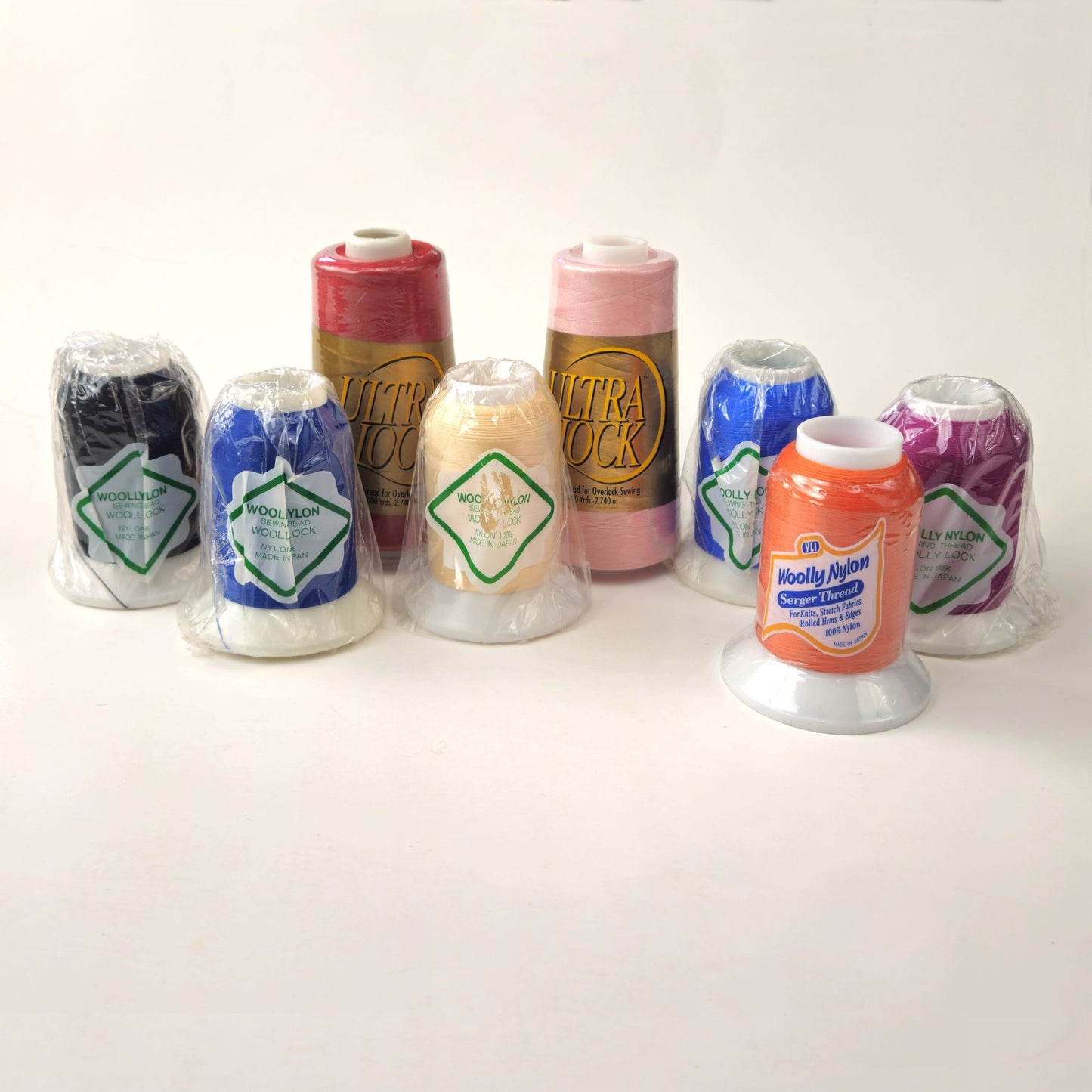 8 SPOOLS SEWING THREAD:  SERGER ULTRA LOCK, WOOLLY NYLON   LF0