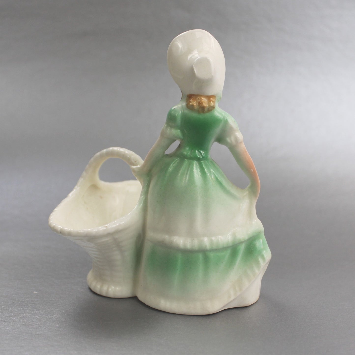VINTAGE CZECHOSLAVAKIA WOMAN WITH BASKET FIGURINE      FM3