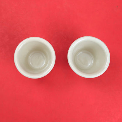 RETIRED LONGABERGER POTTERY:  2 CANDY CORN VOTIVE CANDLE HOLDERS1