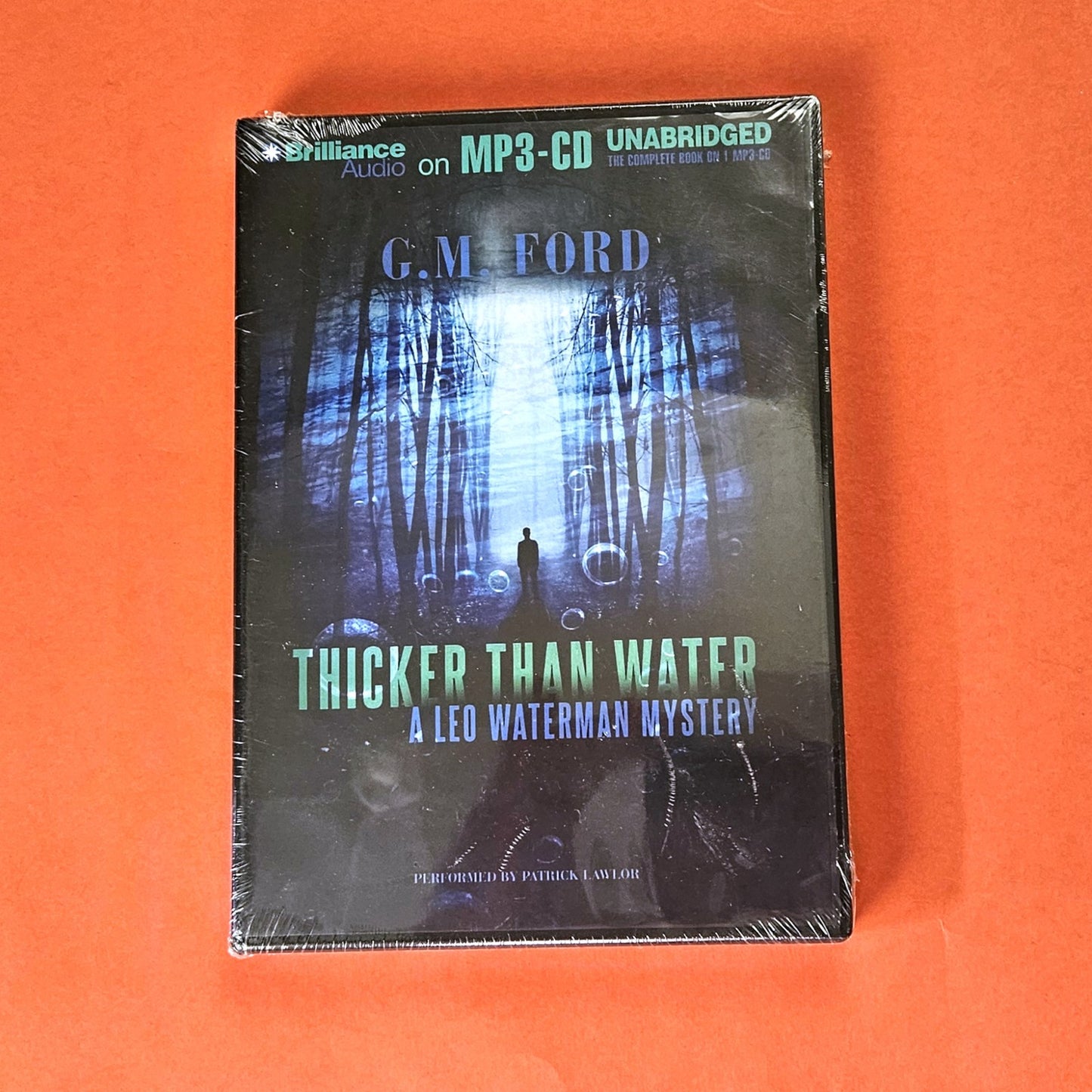 A LEO WATERMAN MYSTERY: THICKER THAN WATER BY G. M. FORD (CD MP3, UA ED)   KD0
