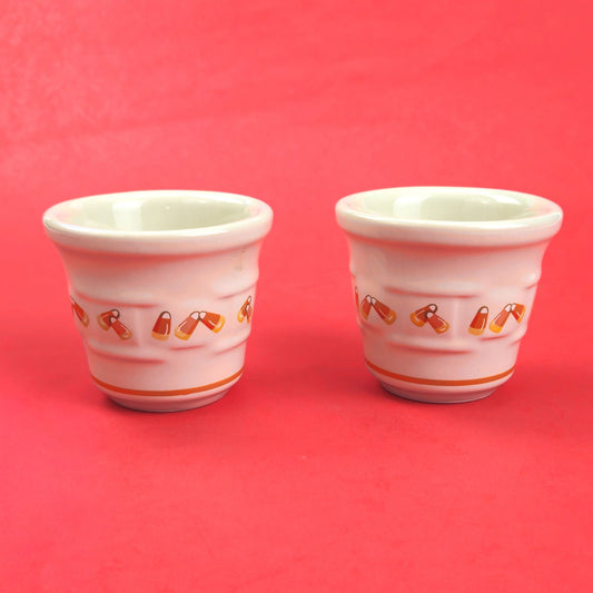 RETIRED LONGABERGER POTTERY:  2 CANDY CORN VOTIVE CANDLE HOLDERS0