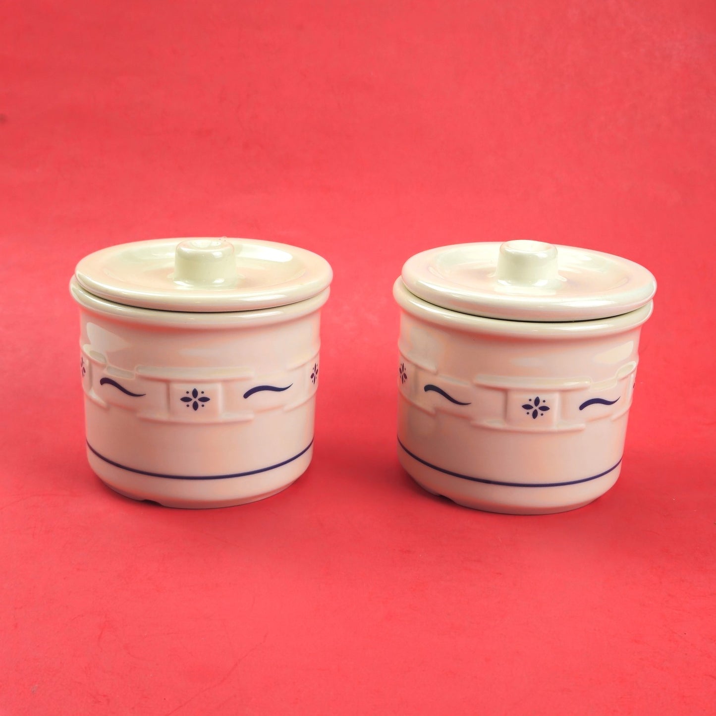 2 RETIRED LONGABERGER POTTERY:  1 PINT CROCKS WITH LIDS WOVEN TRADITIONS BLUE0
