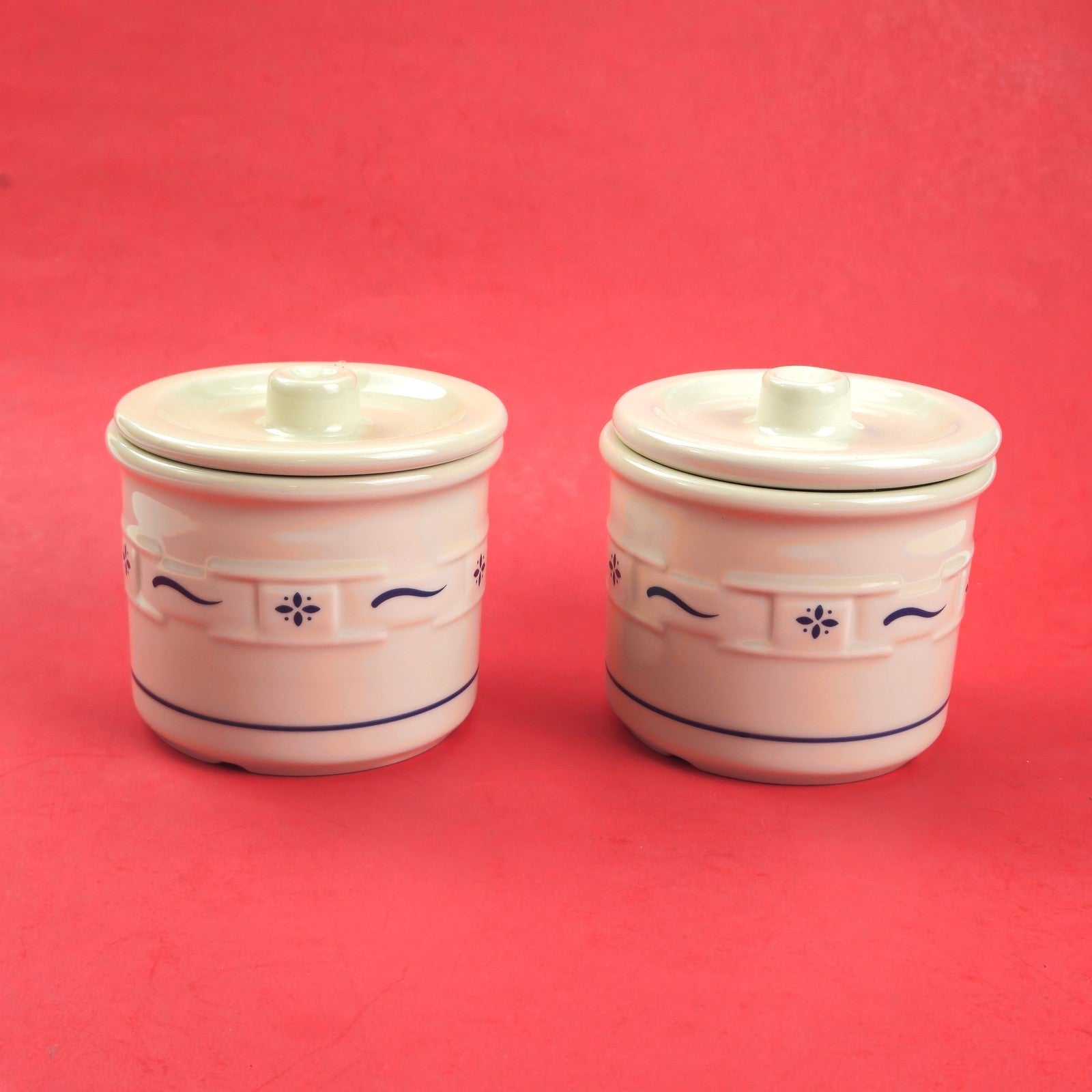 2 RETIRED LONGABERGER POTTERY:  1 PINT CROCKS WITH LIDS WOVEN TRADITIONS BLUE0