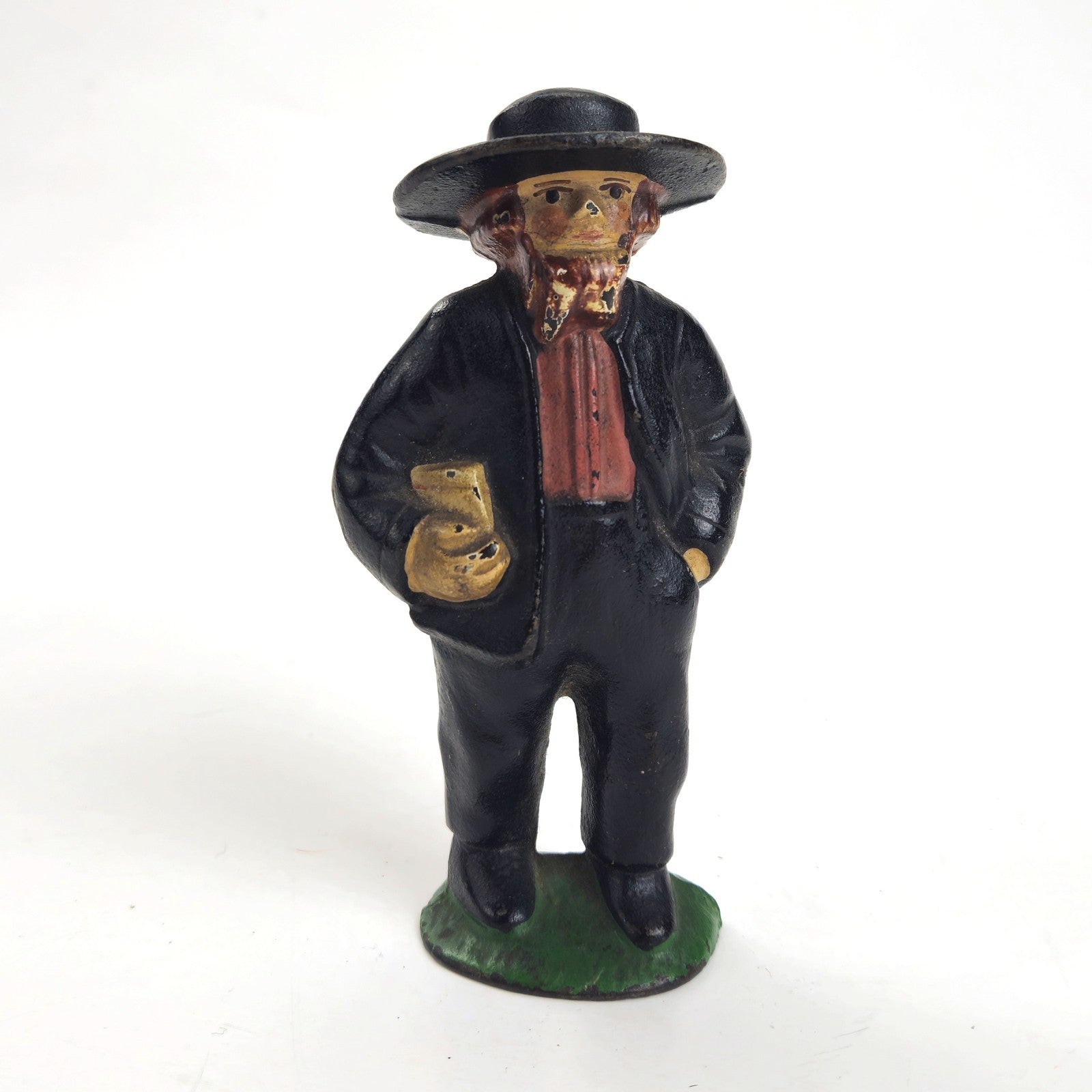 VINTAGE CAST IRON AMISH MAN FIGURINE0