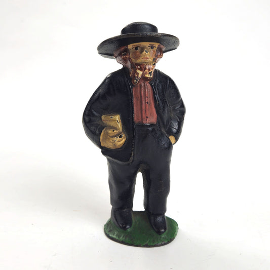VINTAGE CAST IRON AMISH MAN FIGURINE0