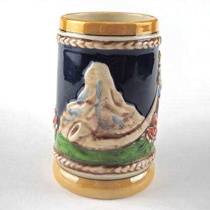 NOVELTY GERMANY BEER STEIN  WITH MAKER MARK: MAIDEN & MAN WITH ALPHORN    LF1