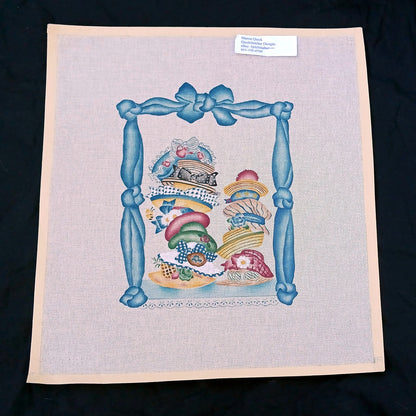 NEEDLEPOINT CANVAS:  TOWER OF HATS     BM1