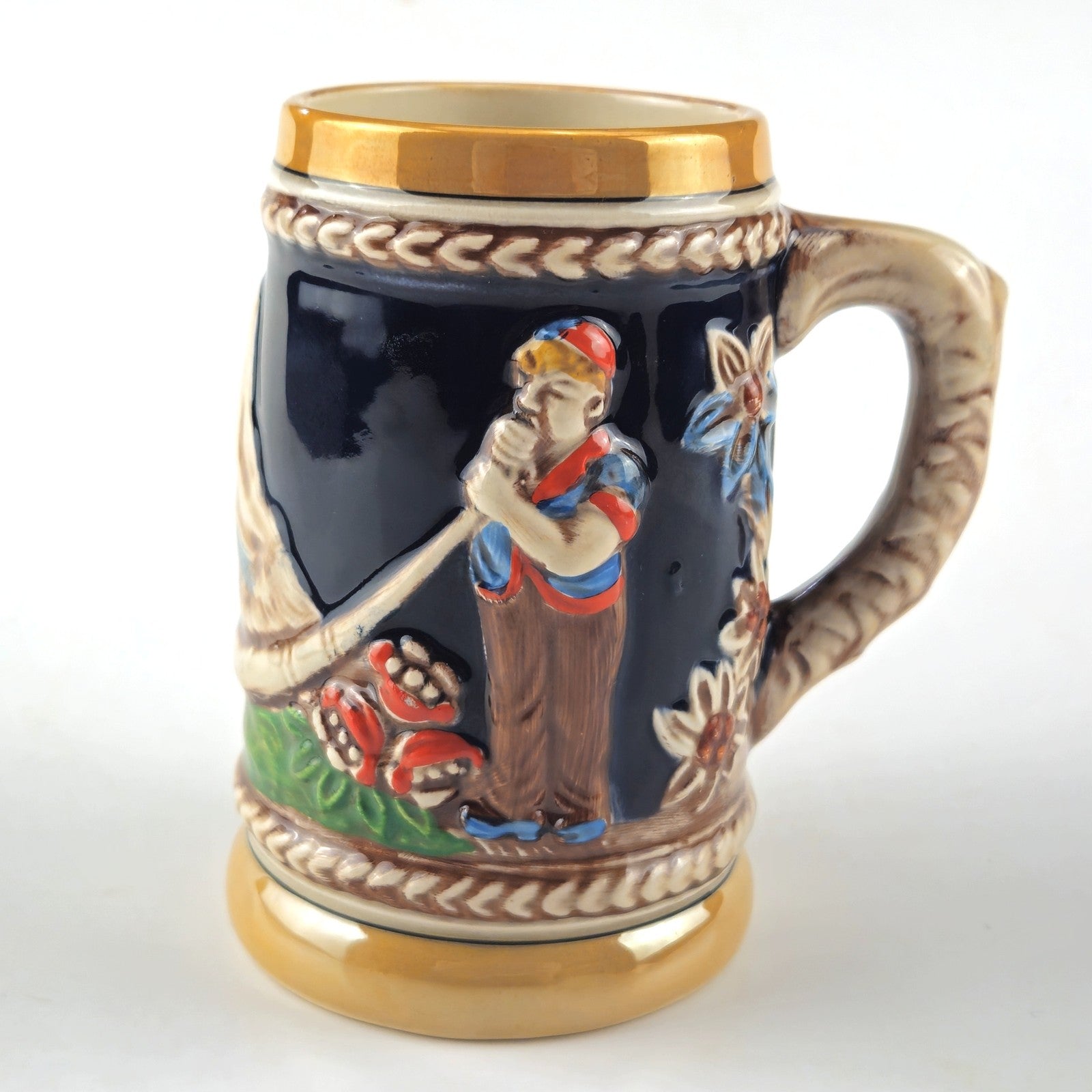 NOVELTY GERMANY BEER STEIN  WITH MAKER MARK: MAIDEN & MAN WITH ALPHORN    LF0